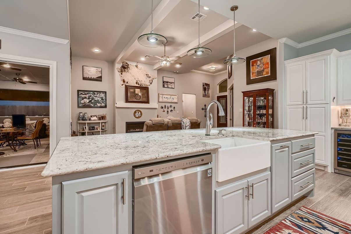 Dining room, Interior, Kitchen, Pendant Lights, Recessed Lighting, Stainless Steel Appliances, Wood Texture Flooring
