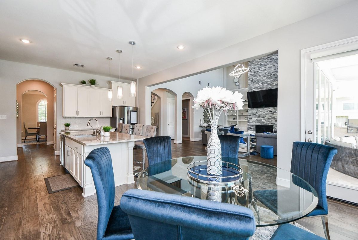 Dining room, Fireplace, Interior, Kitchen, Living room, Pendant Lights, Recessed Lighting, Stainless Steel Appliances, Wood Texture Flooring