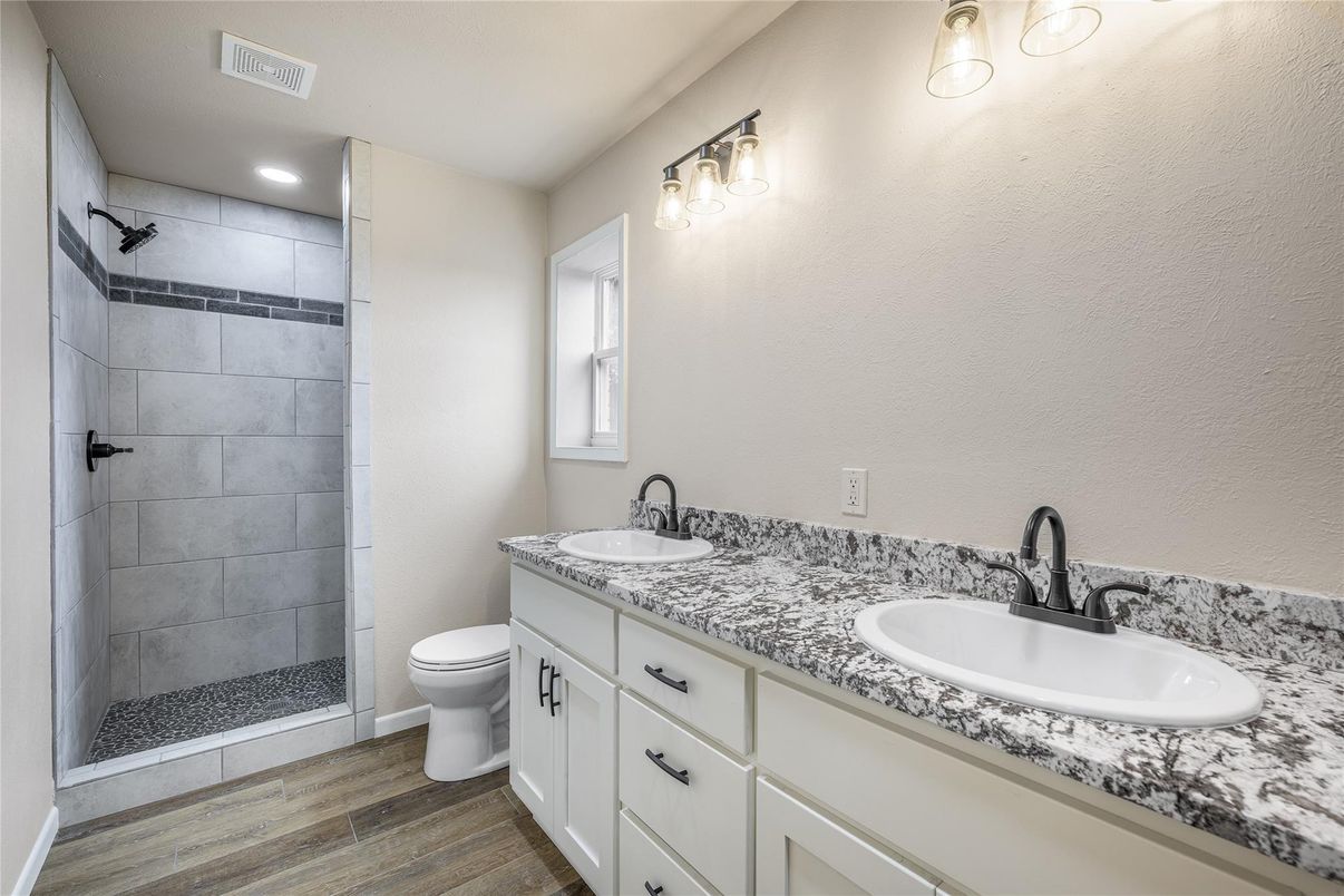 Bathroom, Dual Sink Vanities, Interior, Recessed Lighting, Wood Texture Flooring