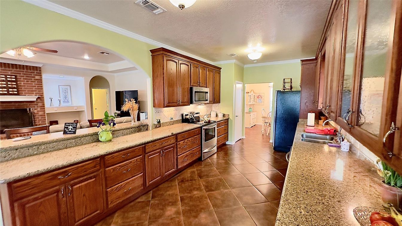 Fireplace, Interior, Kitchen, Recessed Lighting, Stone Walls