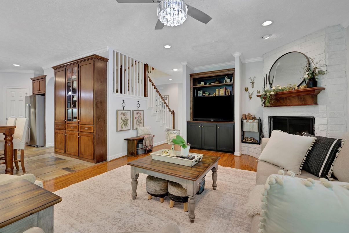 Fireplace, Interior, Living room, Recessed Lighting, Stone Walls, Wood Texture Flooring