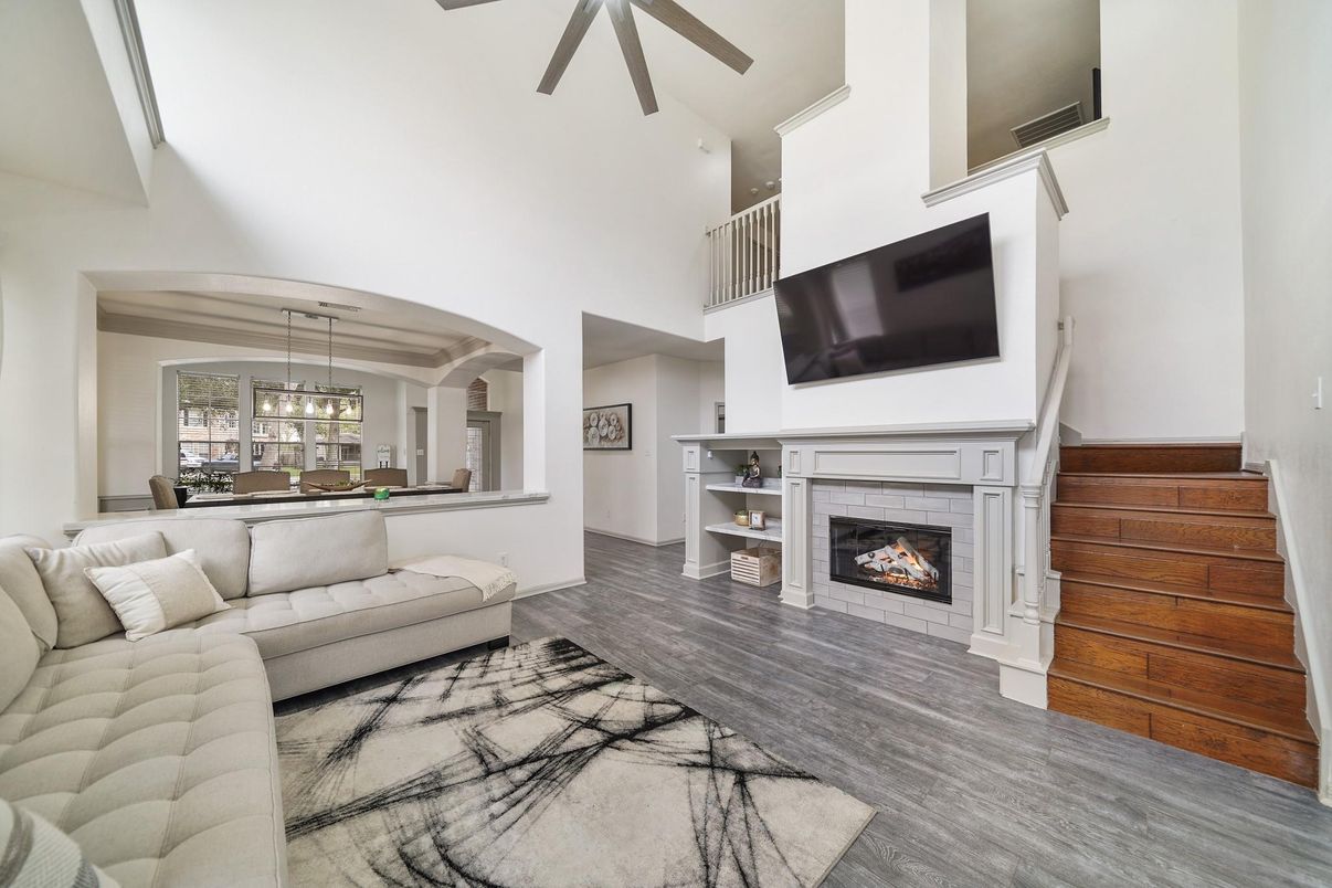 Chandelier, Dining room, Fireplace, Interior, Living room, Pendant Lights, Wood Texture Flooring