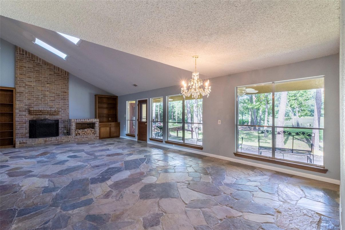 Chandelier, Empty room, Fireplace, Interior, Stone Walls