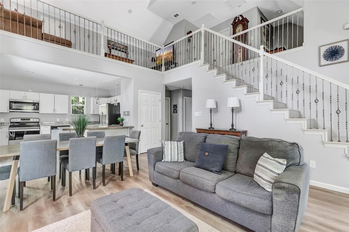 Dining room, Interior, Kitchen, Living room, Recessed Lighting, Stainless Steel Appliances, Wood Texture Flooring