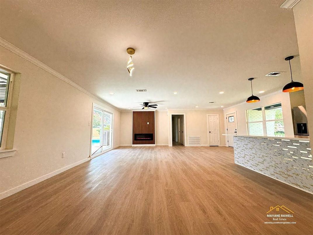 Empty room, Fireplace, Interior, Pendant Lights, Recessed Lighting, Wood Texture Flooring