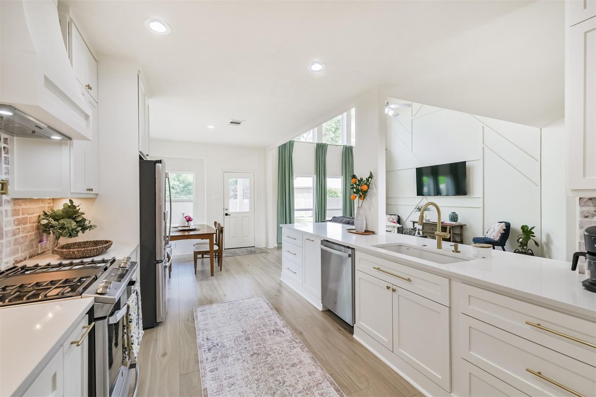 Dining room, Interior, Kitchen, Recessed Lighting, Stainless Steel Appliances, Wood Texture Flooring