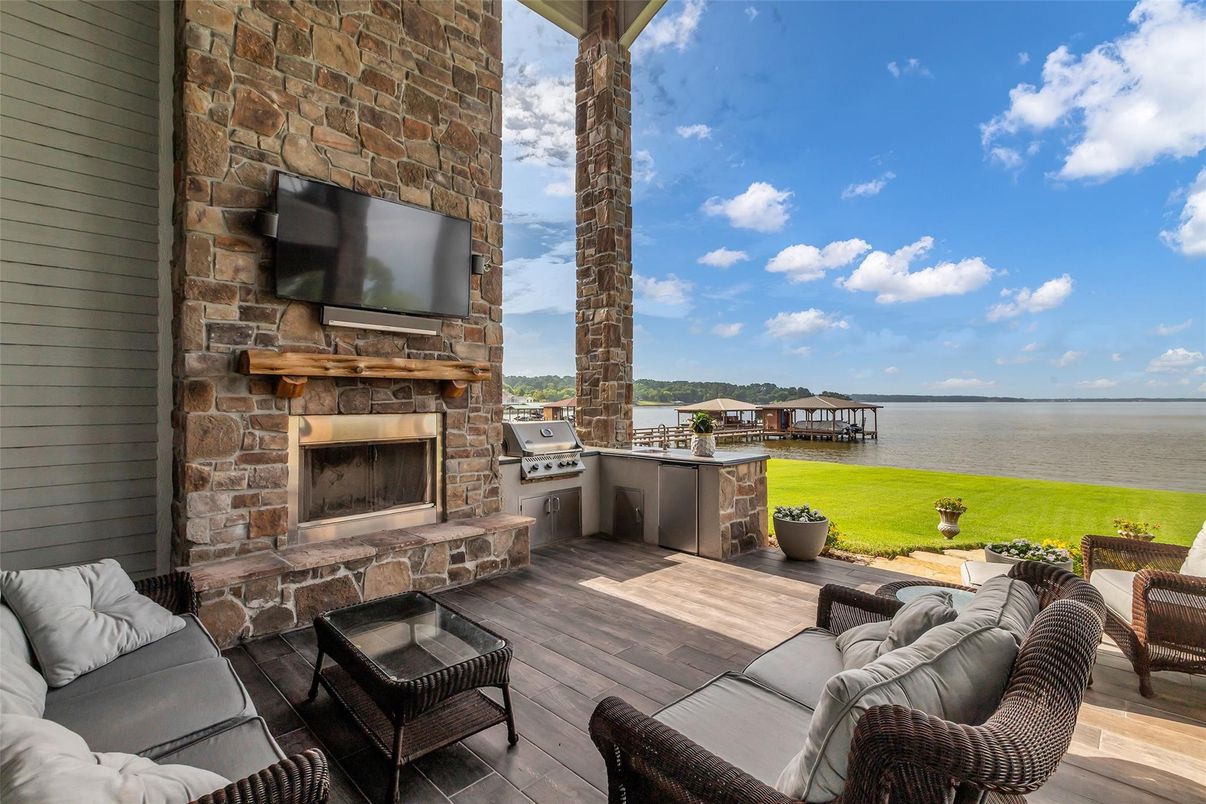 Exterior, Fireplace, Outdoor Kitchen, Water