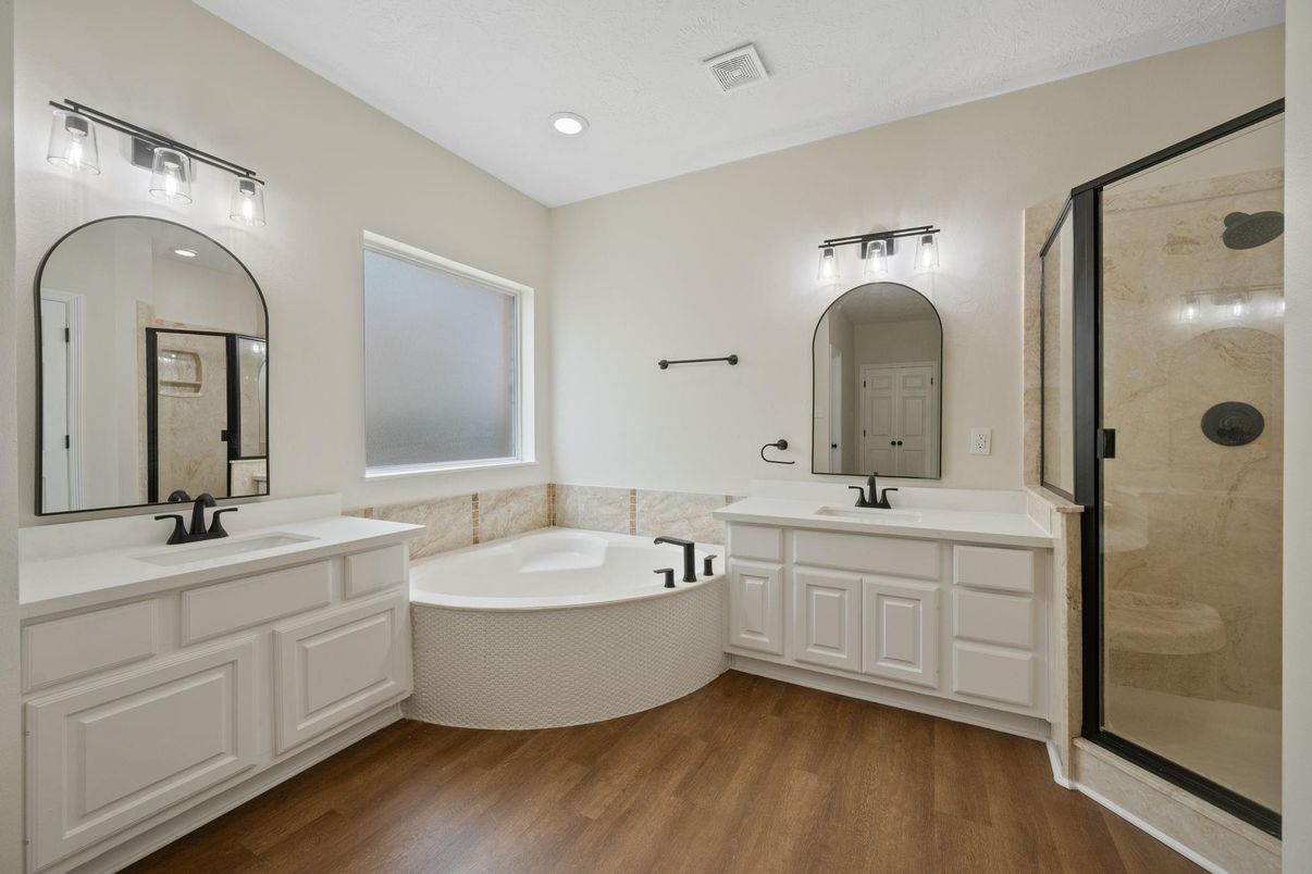 Bathroom, Dual Sink Vanities, Glass Shower, Interior, Recessed Lighting, Wood Texture Flooring