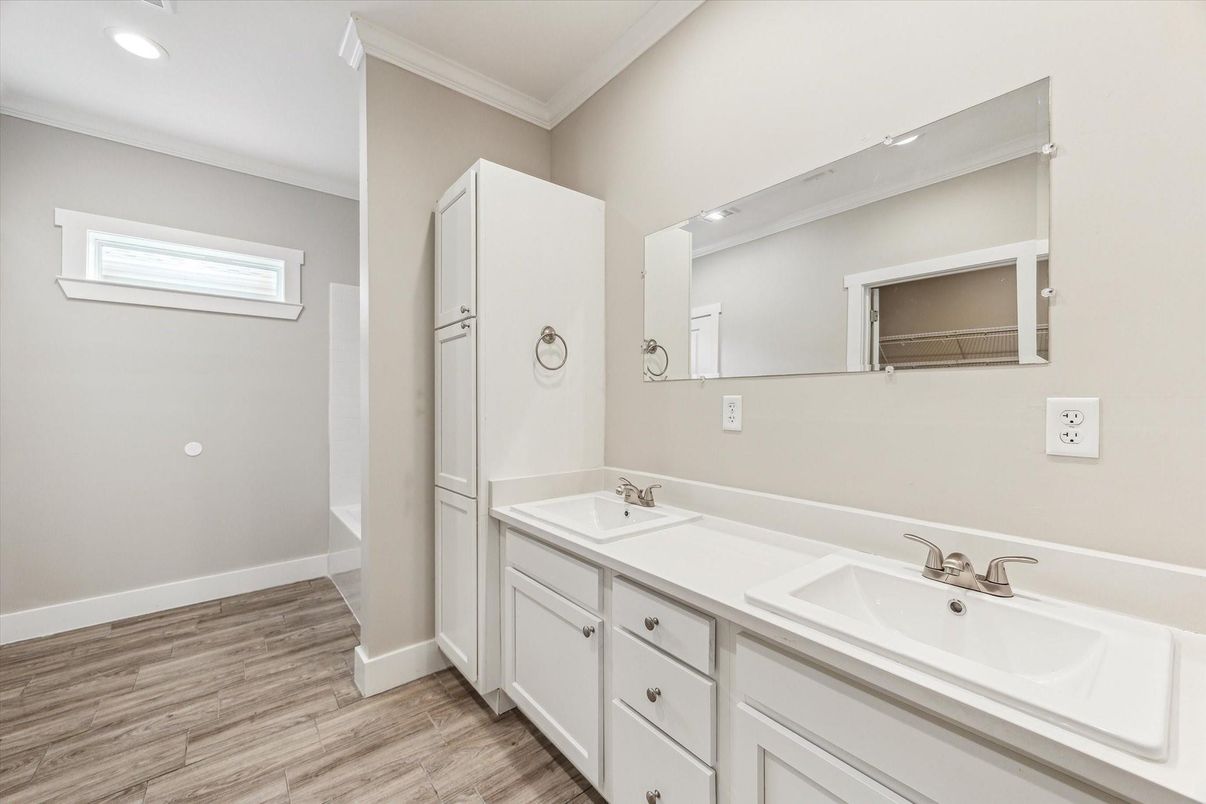 Bathroom, Dual Sink Vanities, Interior, Recessed Lighting, Wood Texture Flooring