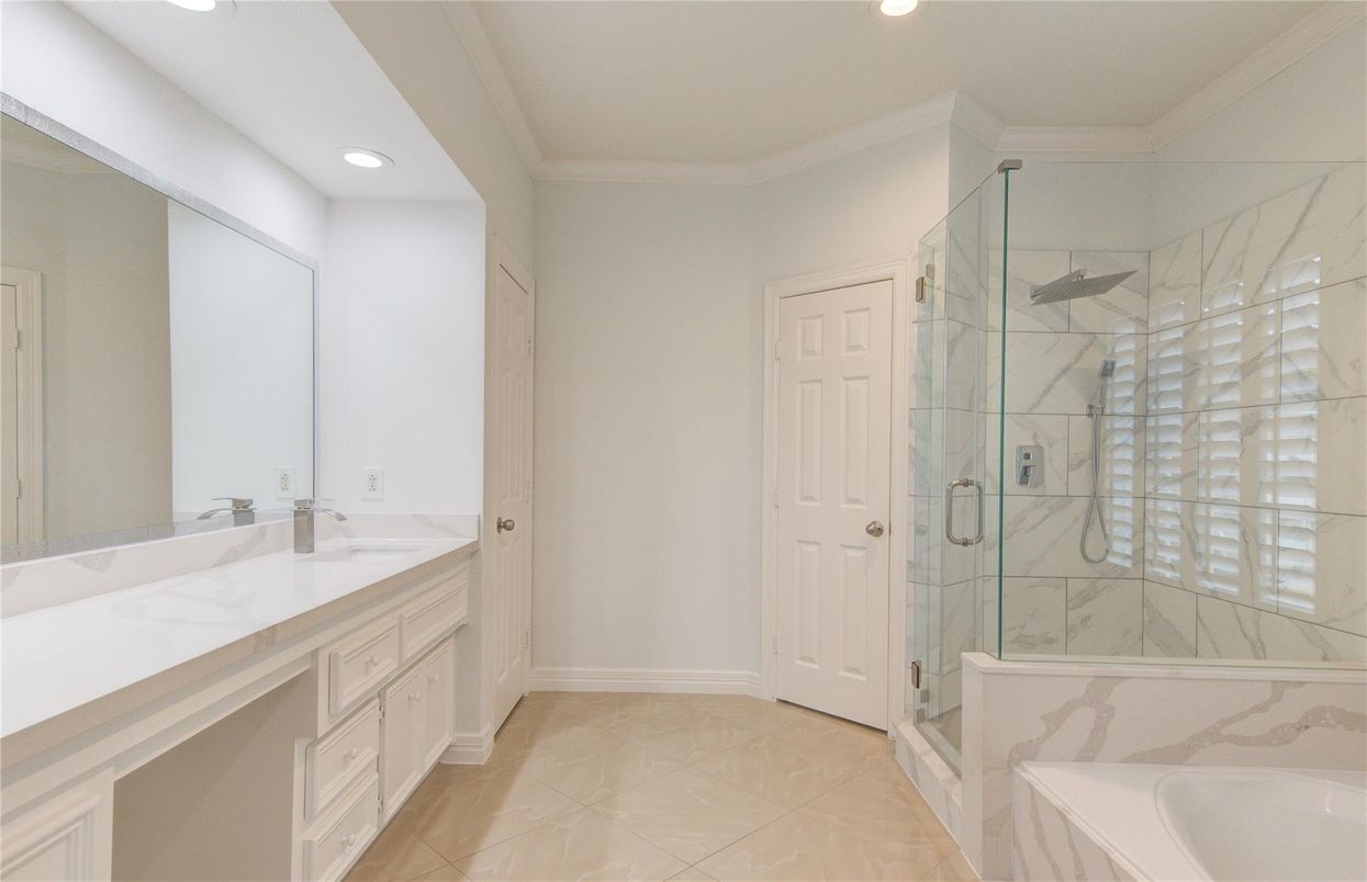 Bathroom, Dual Sink Vanities, Glass Shower, Interior, Marble Walls, Recessed Lighting