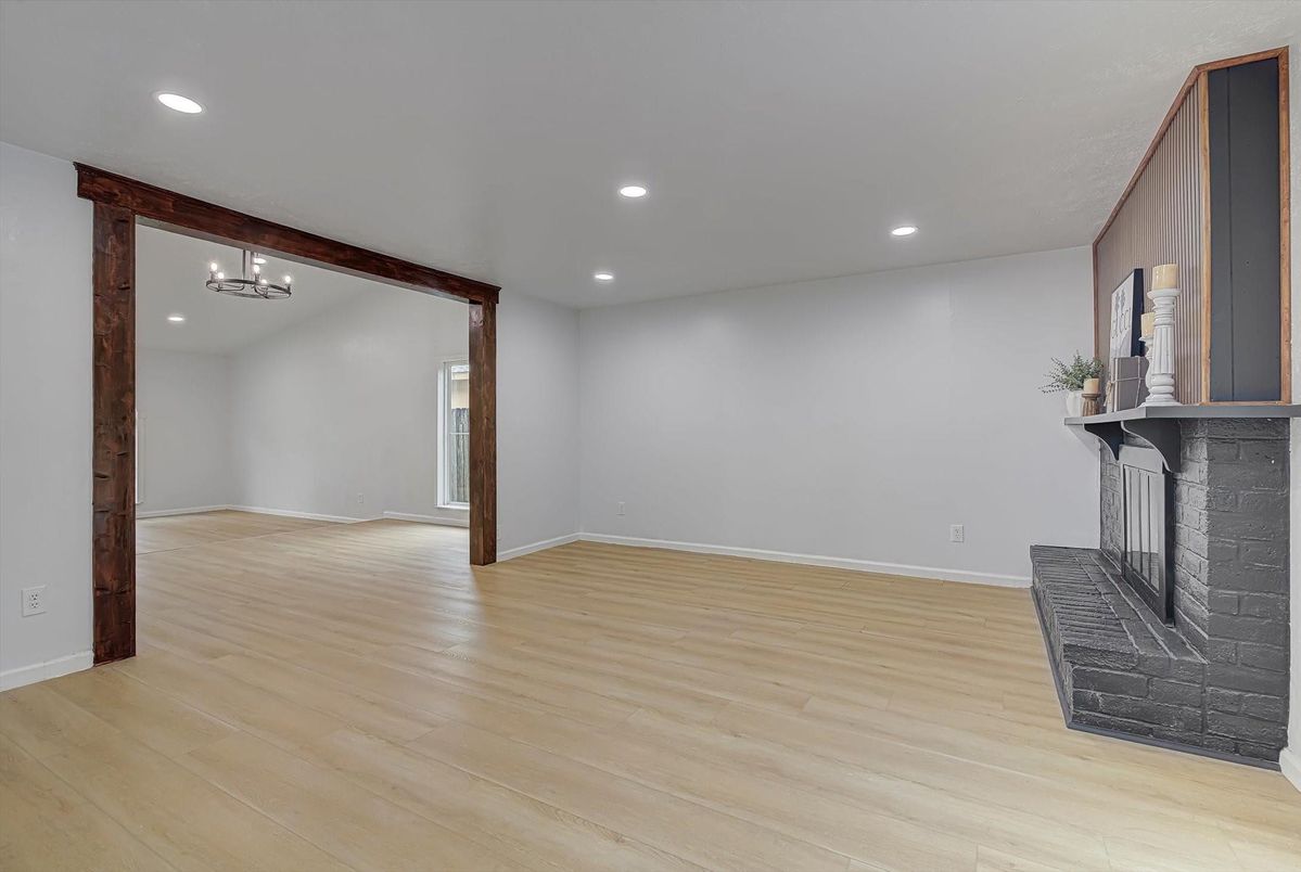 Empty room, Fireplace, Interior, Recessed Lighting, Wood Texture Flooring