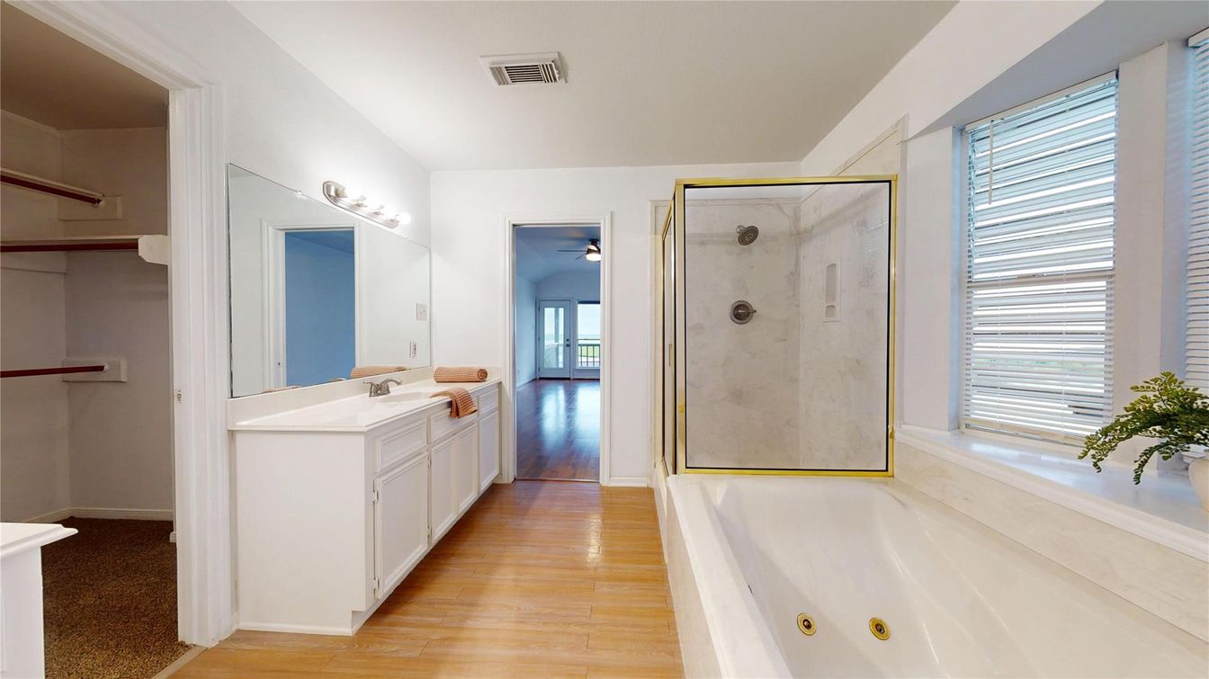 Bathroom, Dual Sink Vanities, Glass Shower, Interior, Wood Texture Flooring