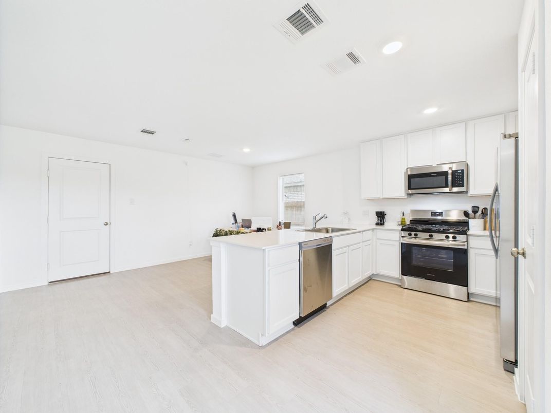 Interior, Kitchen, Recessed Lighting, Stainless Steel Appliances, Wood Texture Flooring