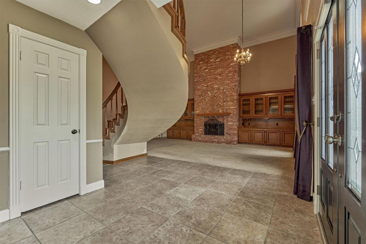 Chandelier, Empty room, Fireplace, Interior