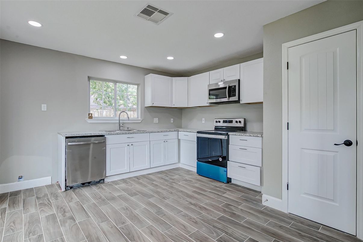 Interior, Kitchen, Recessed Lighting, Stainless Steel Appliances, Wood Texture Flooring