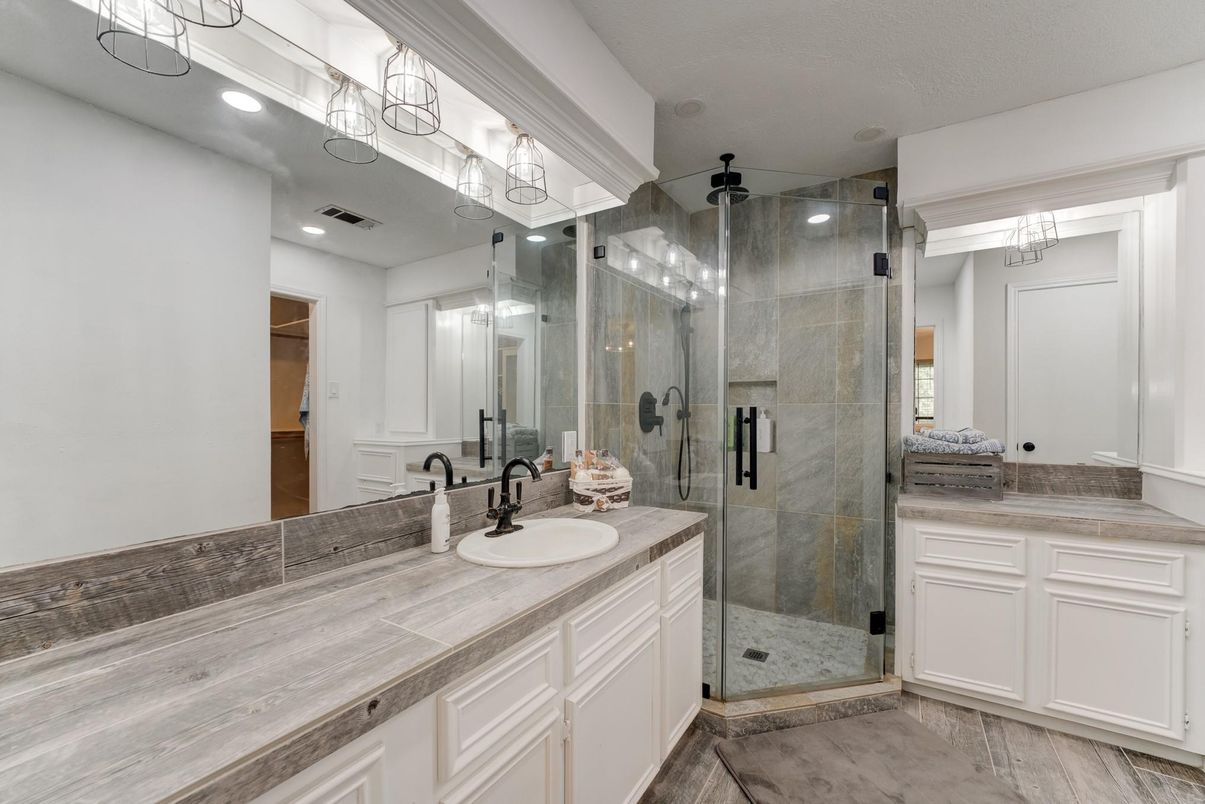 Bathroom, Dual Sink Vanities, Glass Shower, Interior, Recessed Lighting, Tile Countertops