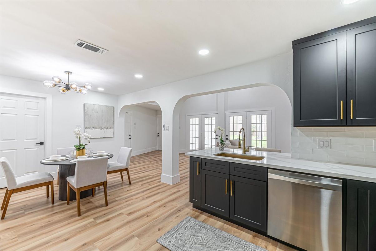 Dining room, Interior, Kitchen, Recessed Lighting, Stainless Steel Appliances, Wood Texture Flooring