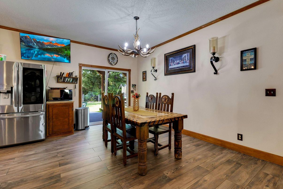Chandelier, Dining room, Interior, Stainless Steel Appliances, Wood Texture Flooring
