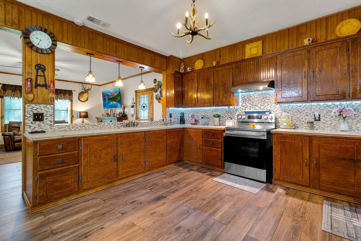 Chandelier, Interior, Kitchen, Pendant Lights, Stainless Steel Appliances, Wood Texture Flooring