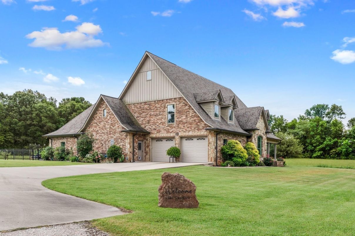 Attached, Backyard, Exterior, Facade, Brick Facade, Tudor Revival