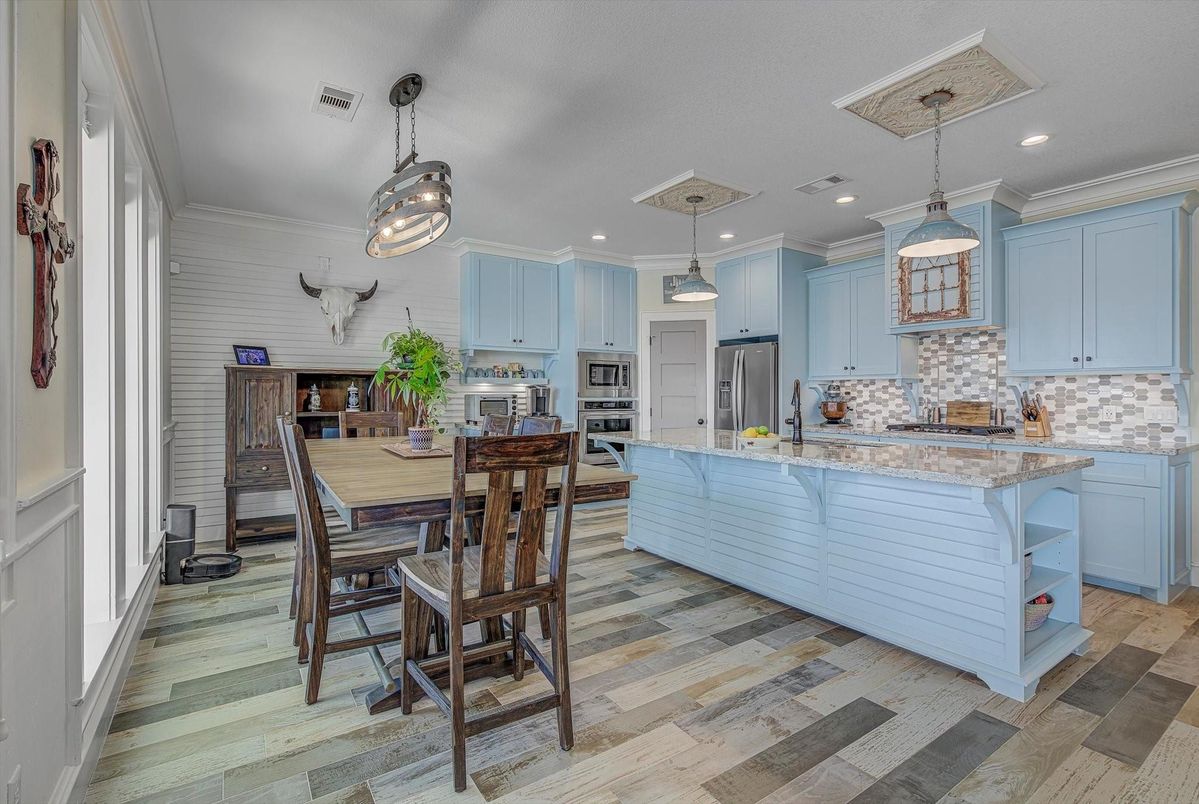 Dining room, Interior, Kitchen, Pendant Lights, Recessed Lighting, Stainless Steel Appliances, Wood Texture Flooring