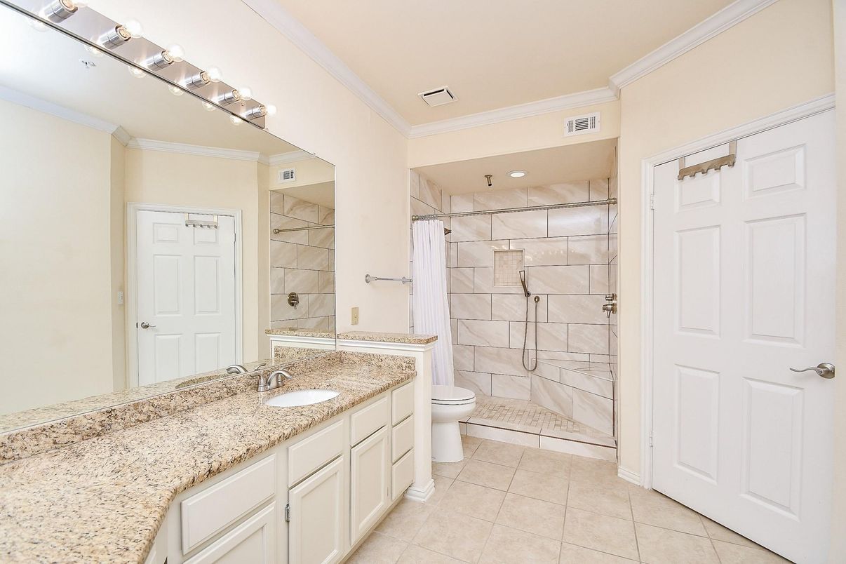 Bathroom, Dual Sink Vanities, Glass Shower, Interior, Marble Walls, Recessed Lighting
