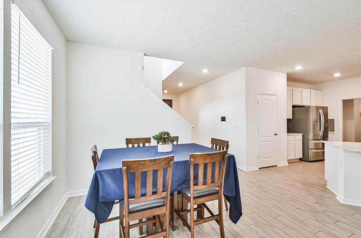 Dining room, Interior, Kitchen, Recessed Lighting, Stainless Steel Appliances, Wood Texture Flooring