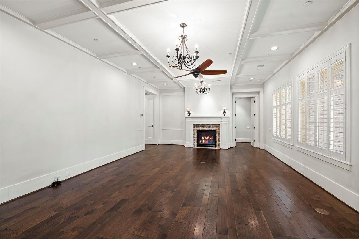 Chandelier, Empty room, Fireplace, Interior, Recessed Lighting, Wood Texture Flooring