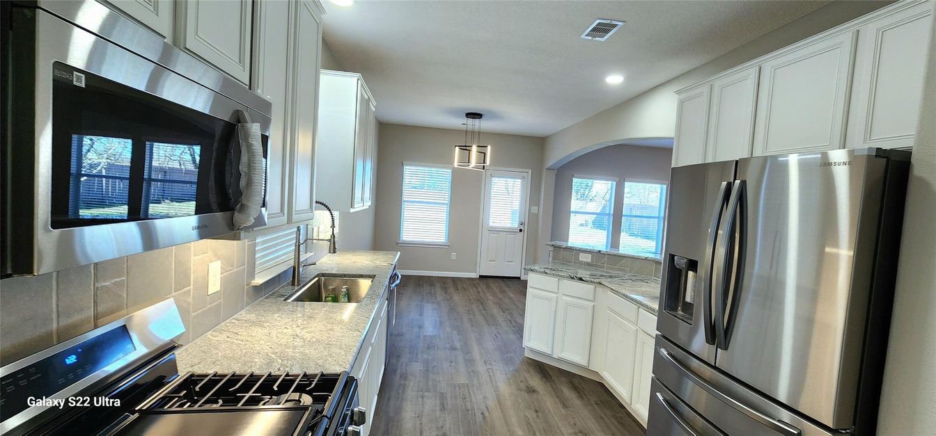 Interior, Kitchen, Pendant Lights, Recessed Lighting, Stainless Steel Appliances, Wood Texture Flooring