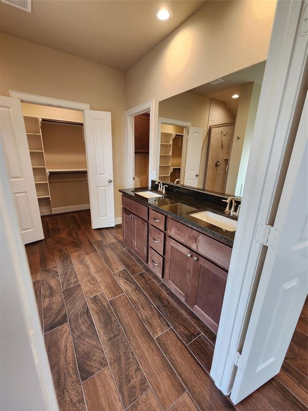 Bathroom, Dual Sink Vanities, Interior, Recessed Lighting, Wood Texture Flooring