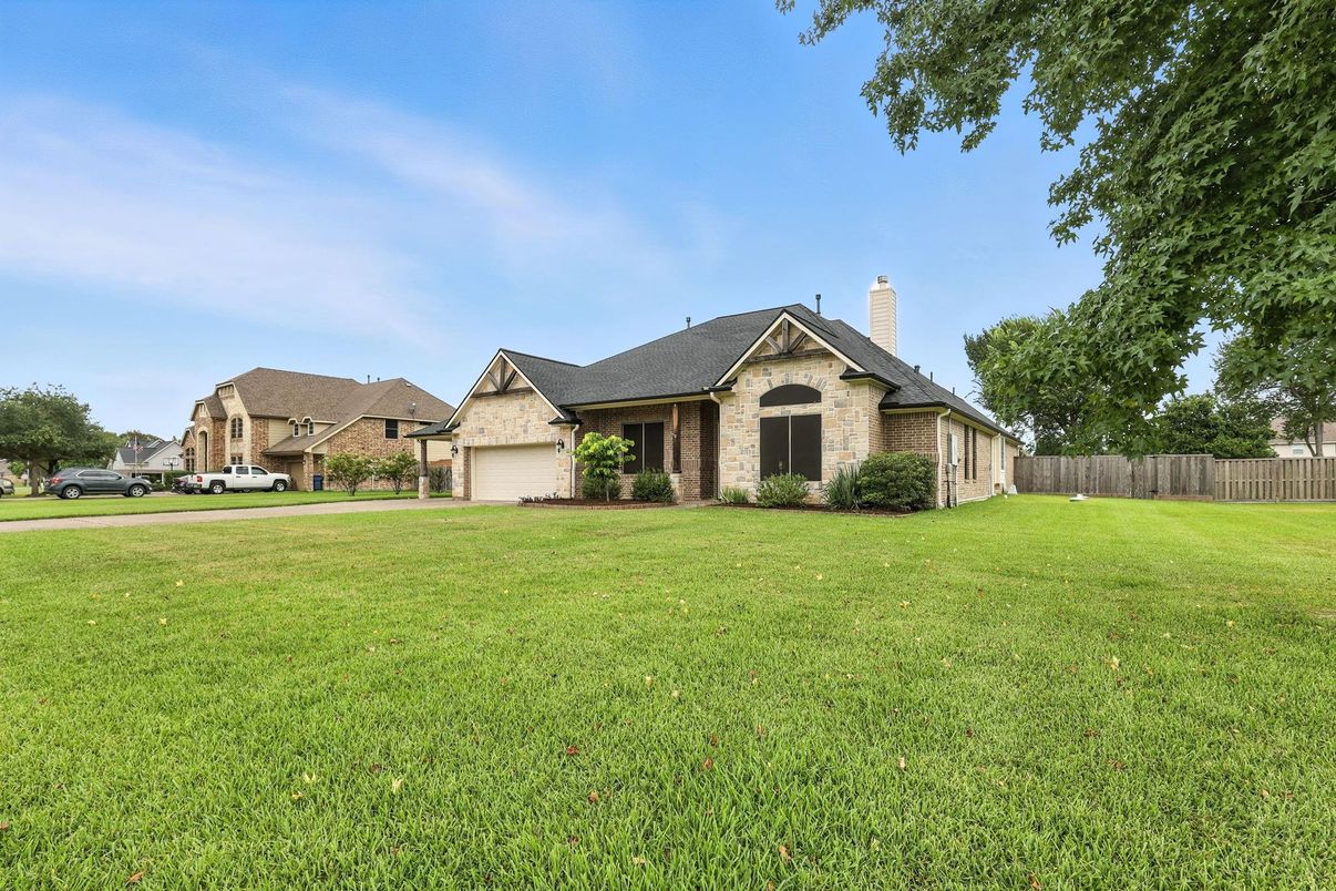 Attached, Backyard, Exterior, Facade, Brick Facade, French Provincial