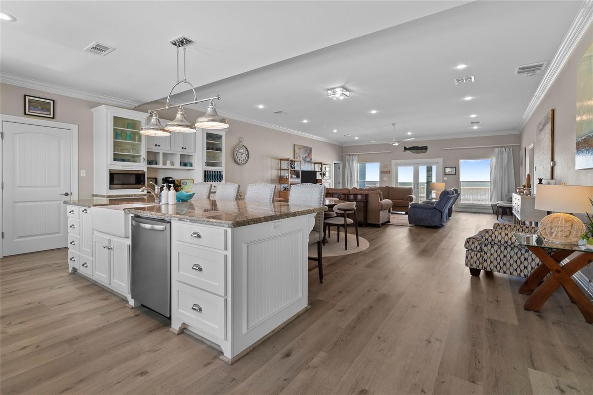 Dining room, Interior, Kitchen, Living room, Pendant Lights, Recessed Lighting, Stainless Steel Appliances, Wood Texture Flooring