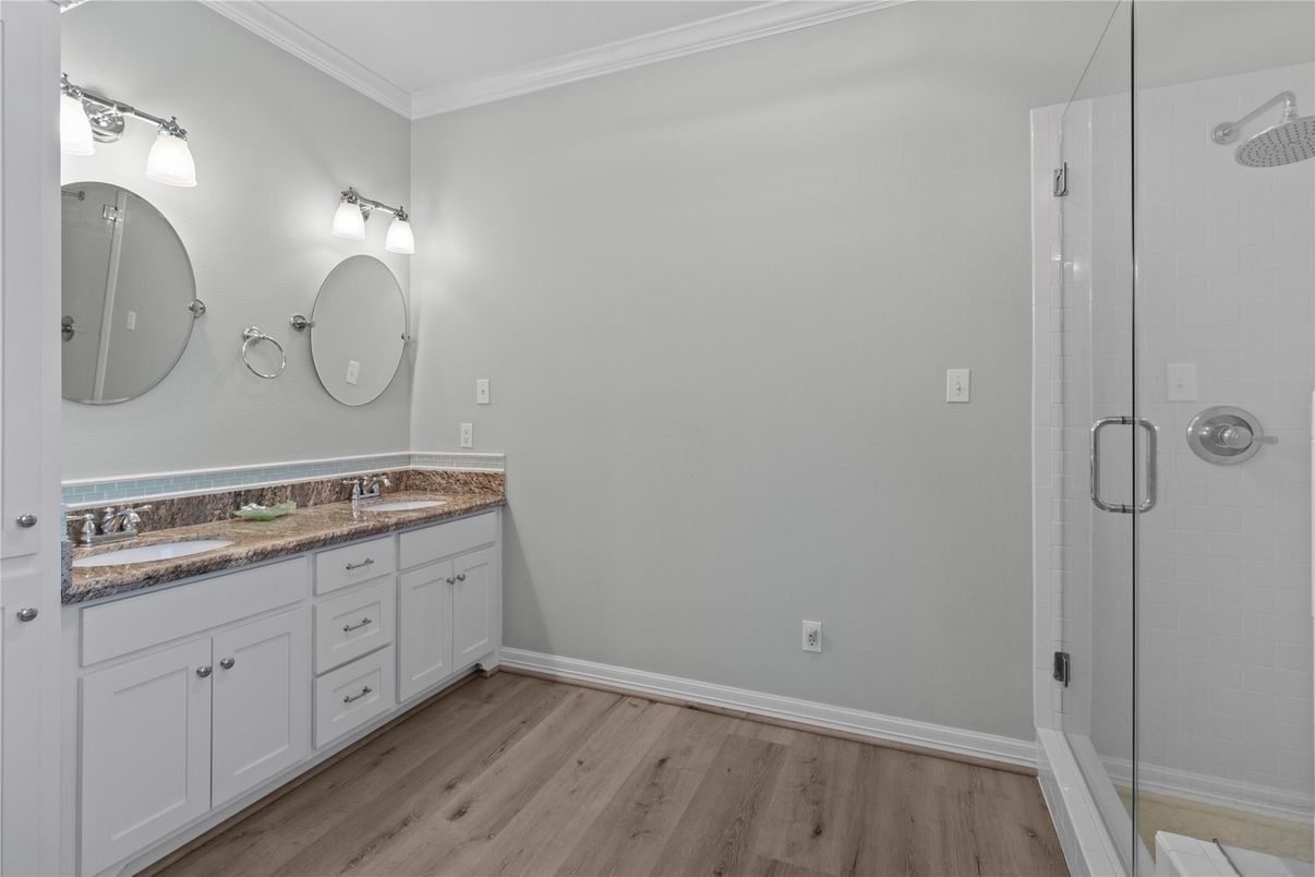 Bathroom, Dual Sink Vanities, Glass Shower, Interior, Wood Texture Flooring