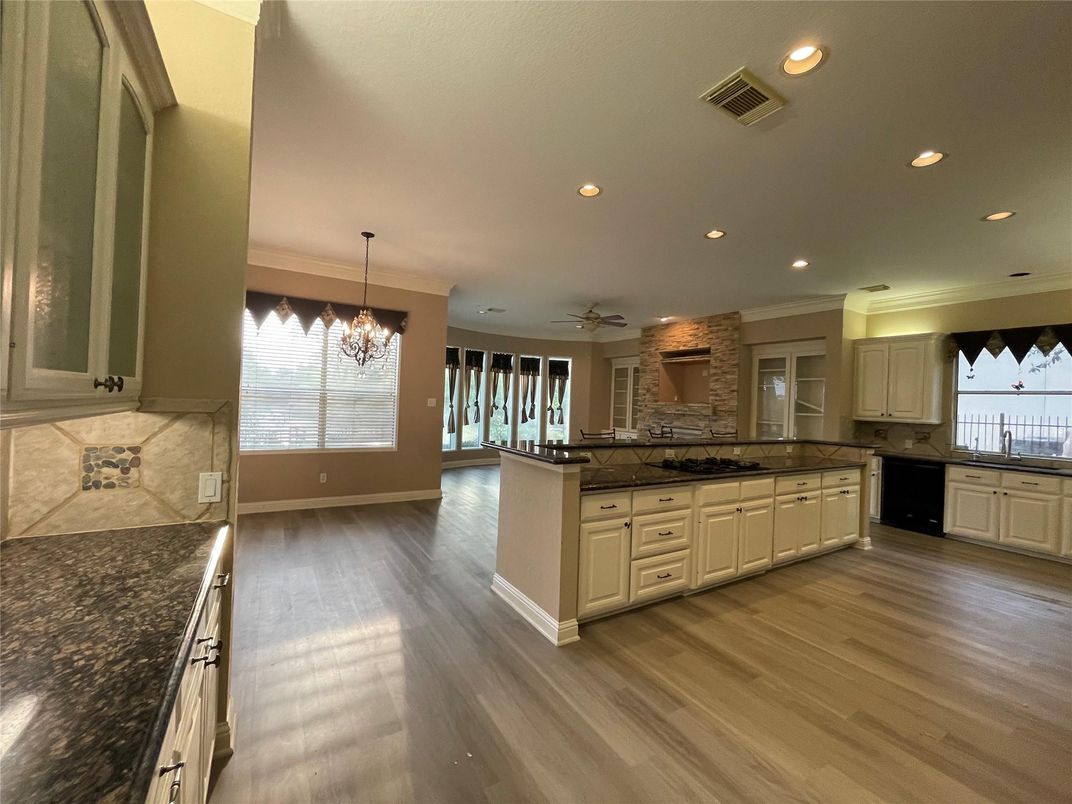 Chandelier, Interior, Kitchen, Pendant Lights, Recessed Lighting, Stone Walls, Wood Texture Flooring