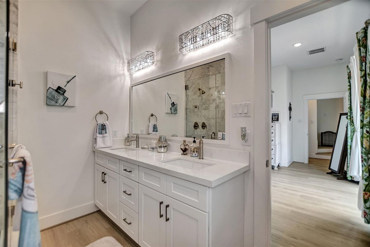 Bathroom, Dual Sink Vanities, Interior, Recessed Lighting, Wood Texture Flooring
