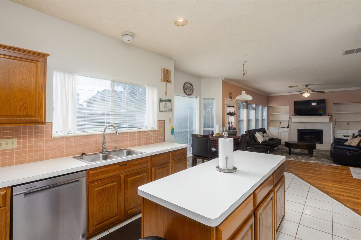 Dining room, Fireplace, Interior, Kitchen, Living room, Pendant Lights, Recessed Lighting, Wood Texture Flooring