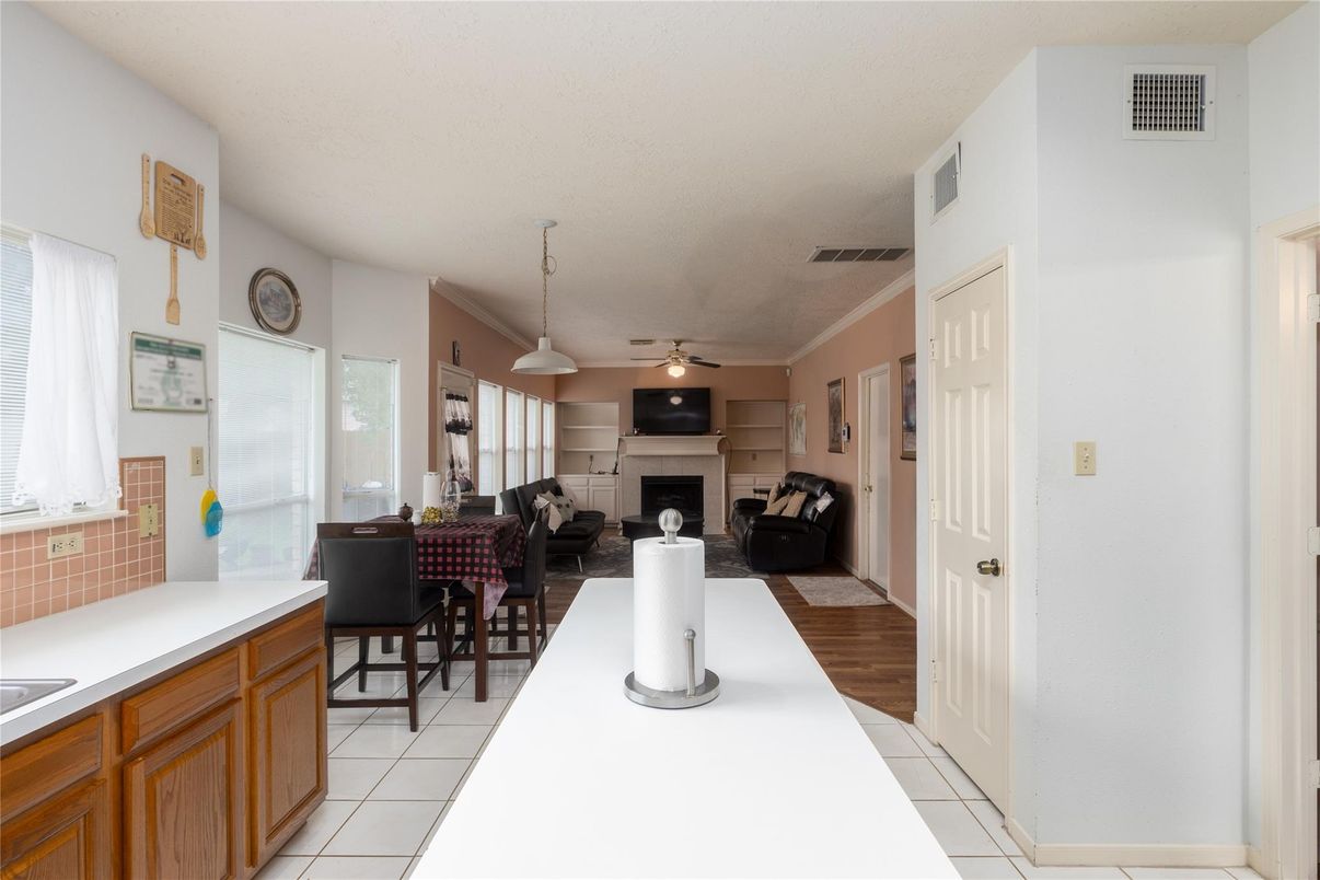 Dining room, Fireplace, Interior, Living room, Pendant Lights, Wood Texture Flooring