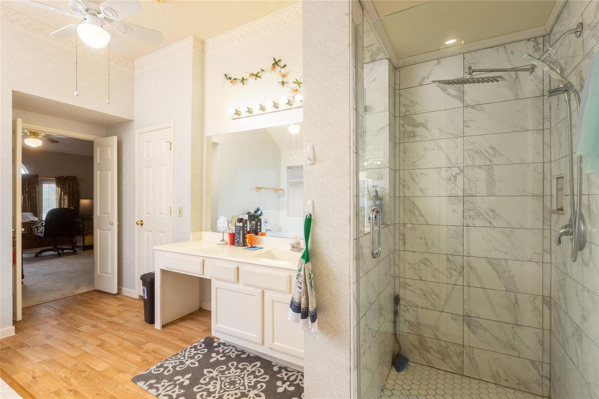 Bathroom, Glass Shower, Interior, Marble Walls, Recessed Lighting, Wood Texture Flooring