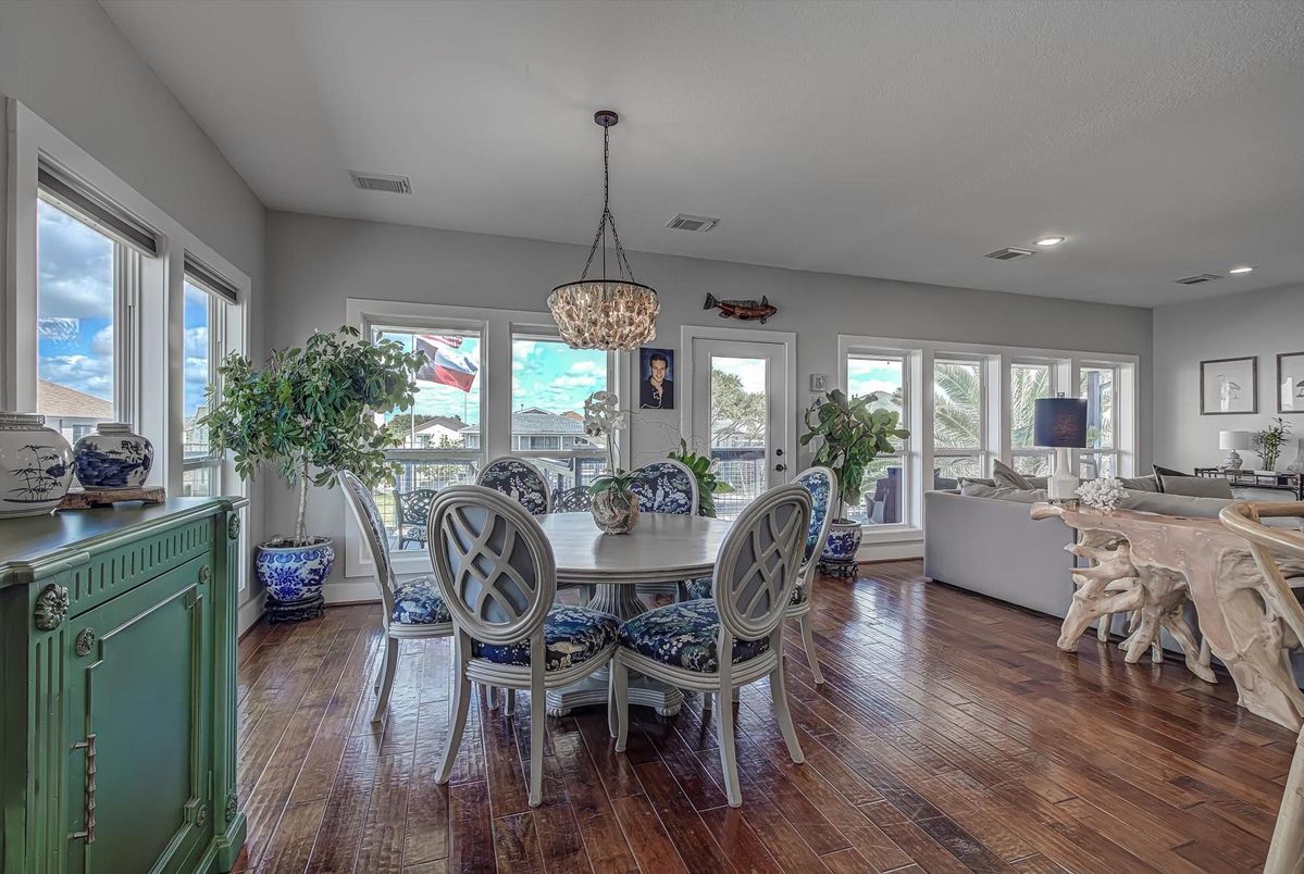 Chandelier, Dining room, Interior, Living room, Pendant Lights, Recessed Lighting, Water, Wood Texture Flooring