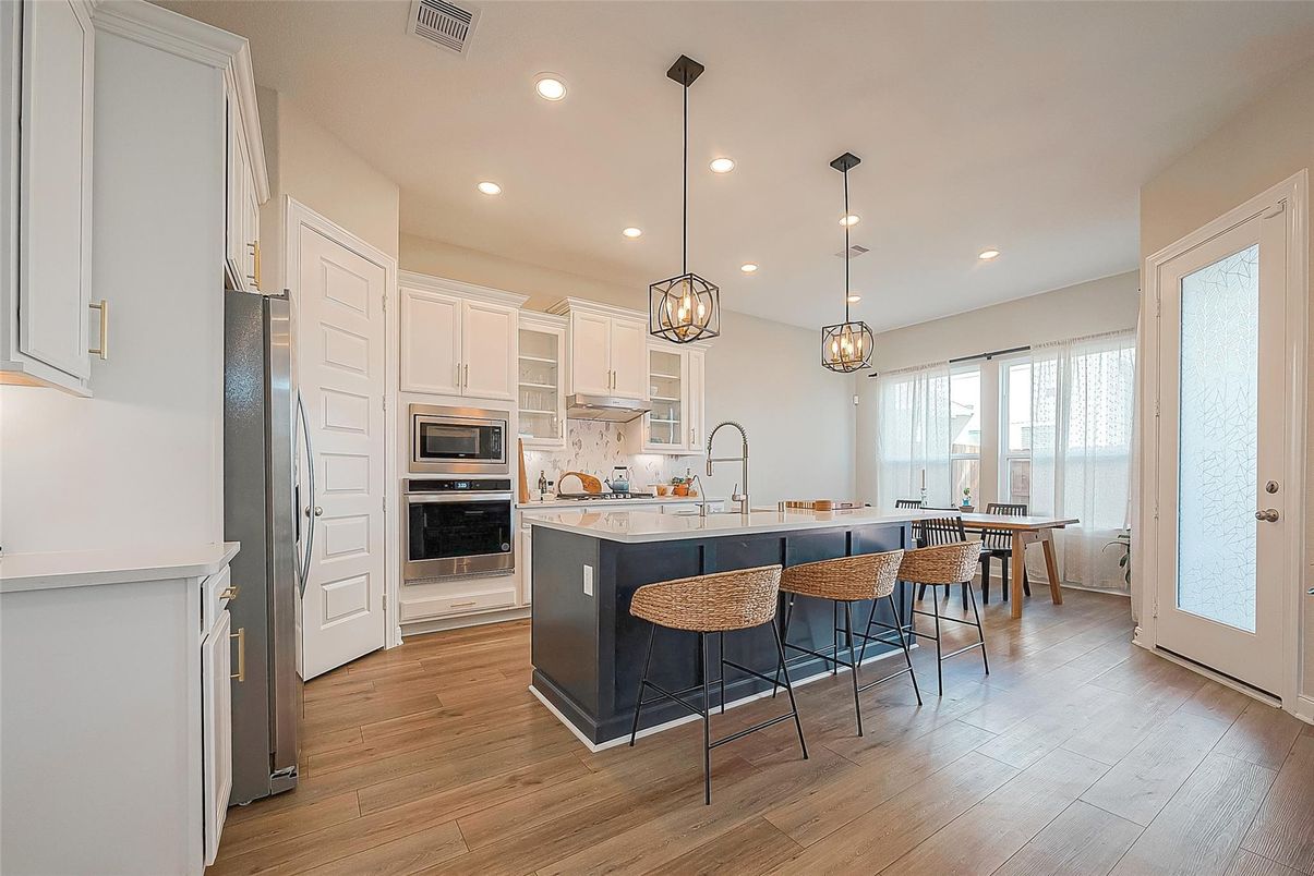 Interior, Kitchen, Pendant Lights, Recessed Lighting, Stainless Steel Appliances, Wood Texture Flooring