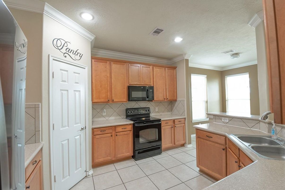 Interior, Kitchen, Recessed Lighting, Tile Countertops
