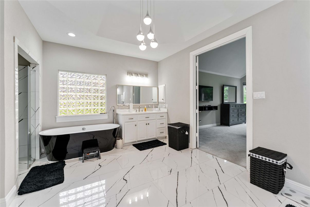 Bathroom, Dual Sink Vanities, Free Standing Baths, Interior, Marble, Pendant Lights, Recessed Lighting