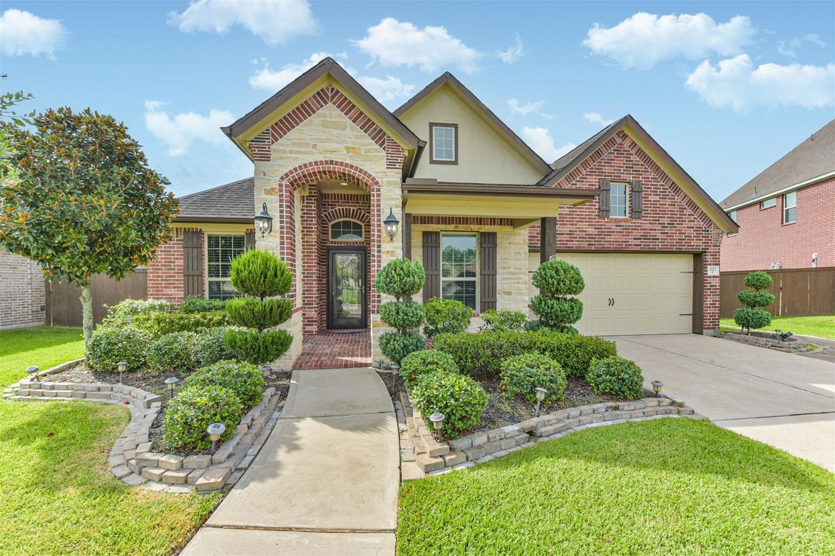 Attached, Exterior, Facade, Brick Facade, Brick Traditional