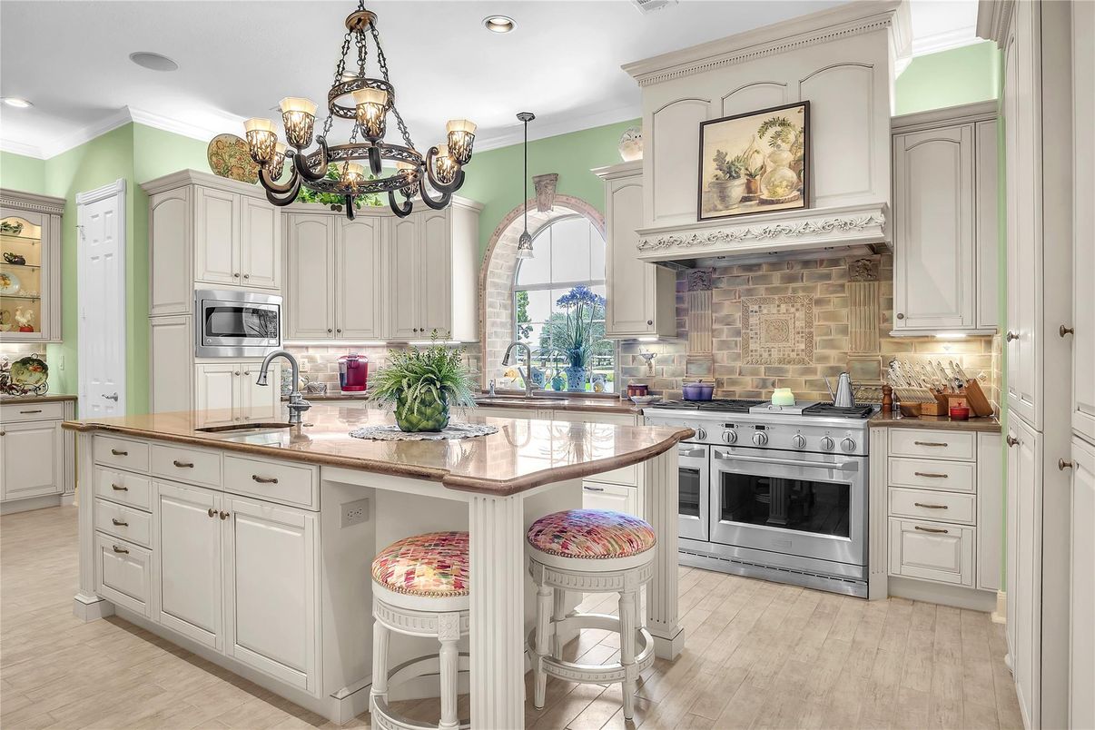 Chandelier, Interior, Kitchen, Pendant Lights, Recessed Lighting, Stainless Steel Appliances, Wood Texture Flooring