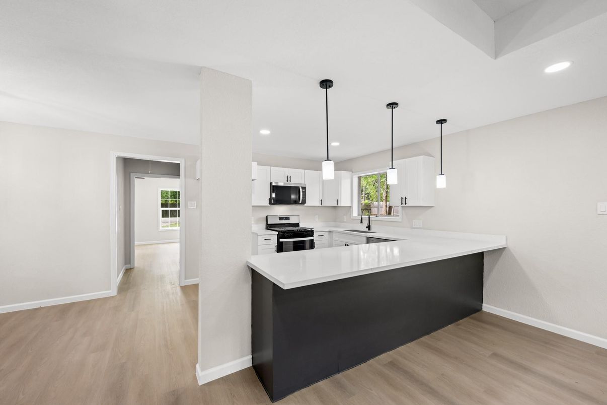 Interior, Kitchen, Pendant Lights, Recessed Lighting, Stainless Steel Appliances, Wood Texture Flooring