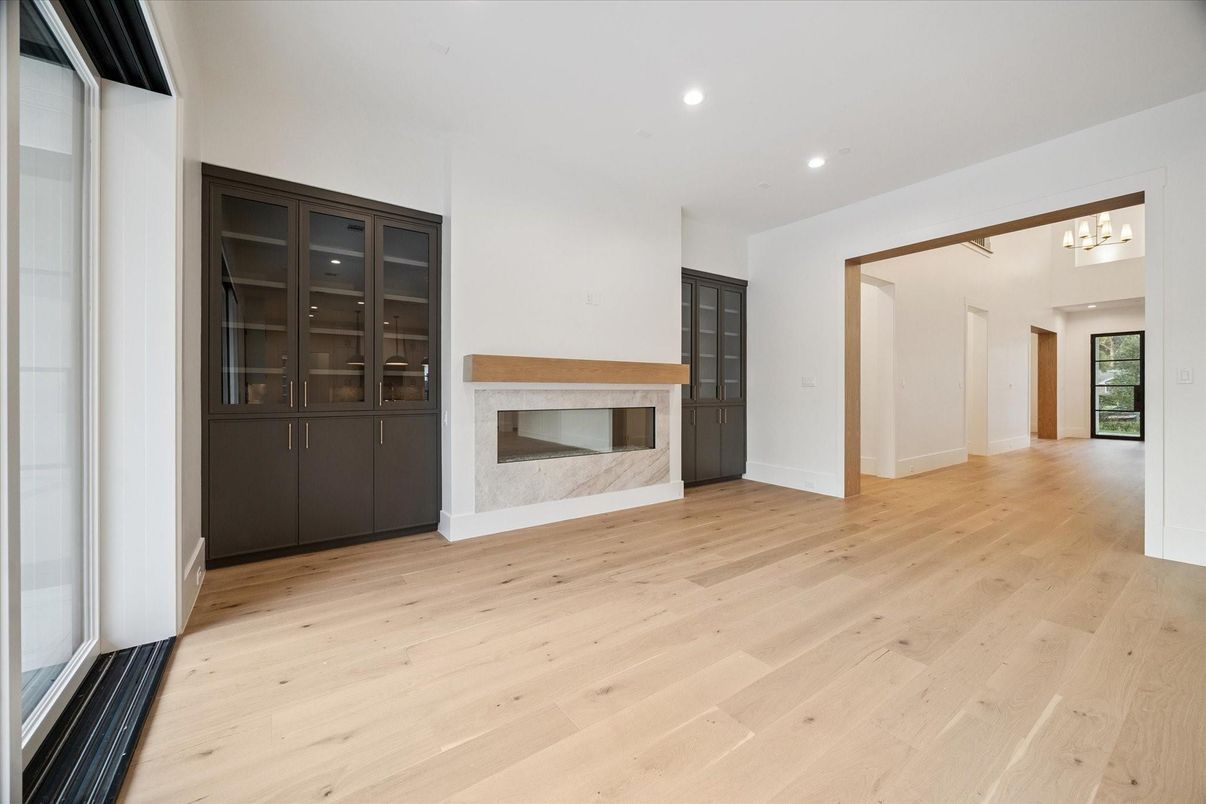 Empty room, Fireplace, Interior, Recessed Lighting, Wood Texture Flooring