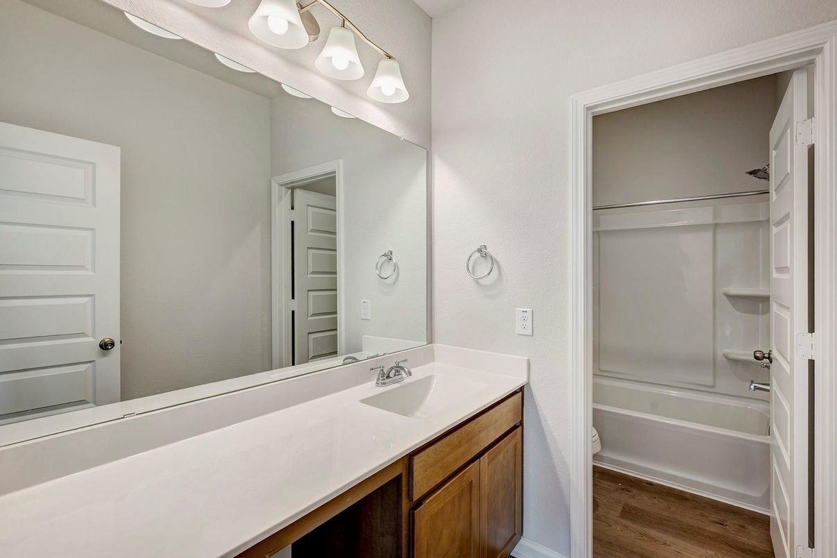 Bathroom, Dual Sink Vanities, Glass Shower, Interior, Wood Texture Flooring