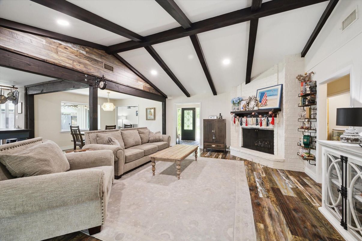 Dining room, Fireplace, Interior, Living room, Pendant Lights, Recessed Lighting, Stone Walls, Wooden Beams, Wood Texture Flooring