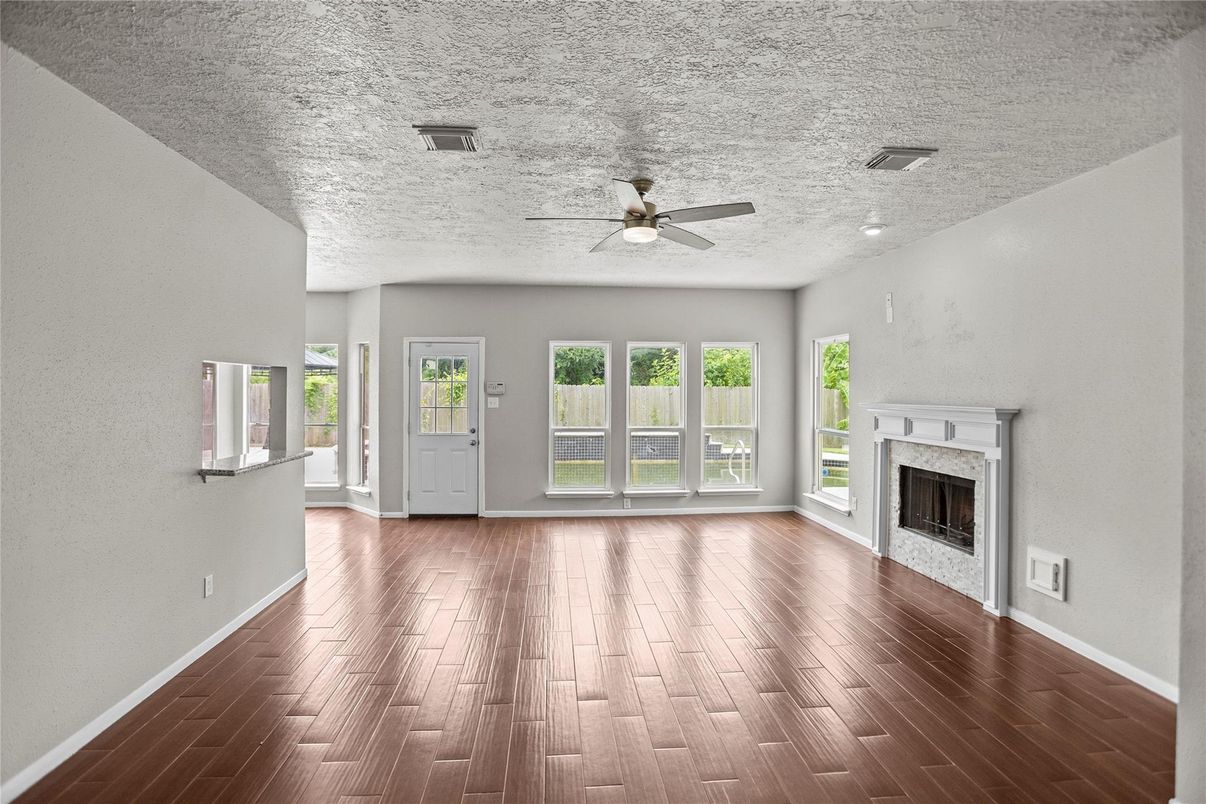 Empty room, Fireplace, Interior, Recessed Lighting, Wood Texture Flooring