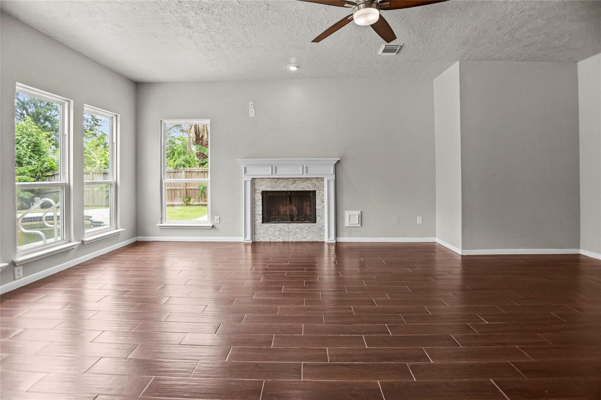 Empty room, Fireplace, Interior, Recessed Lighting, Wood Texture Flooring